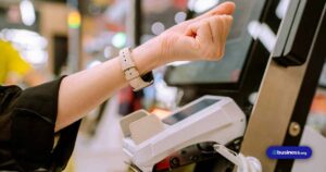 person-using-watch-to-checkout